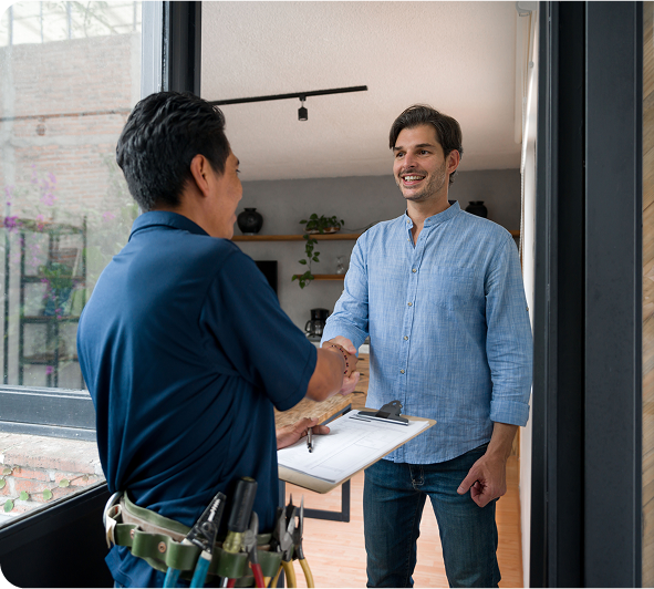 technician shaking hands with client
