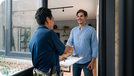 technician shaking hands with client