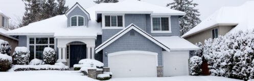 A snow-covered Warrenville home